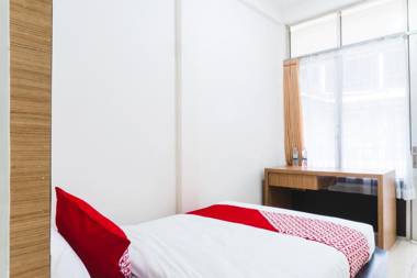 Vaccinated Staff - OYO 617 Sukaraja Residence Syariah