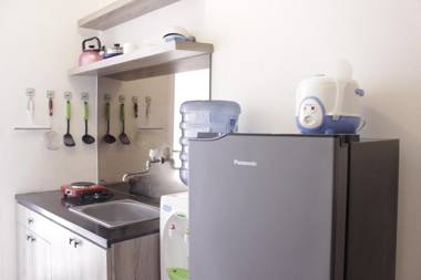 Homey 1BR @ Parahyangan Apt near UNPAR By Travelio