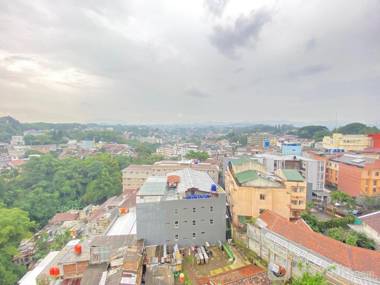 Comfy Bright 1BR Parahyangan Residence By Travelio