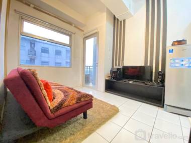 Bright 1BR Grand Asia Afrika Residence By Travelio