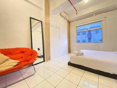 Bright 1BR Grand Asia Afrika Residence By Travelio