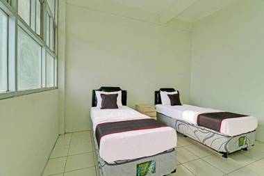 Capital O 91466 Hotel Neu Backpacker Tf Syariah (smk Tb)