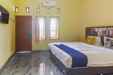 Vaccinated Staff - SPOT ON 3005 Kost Rumaisha Syariah