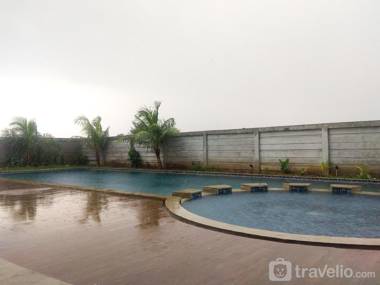 Homey Studio at The Enviro Apartment By Travelio