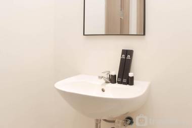 Warm and Cozy Living 3BR at Meikarta By Travelio