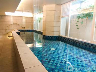 Comfort Minimalist 1BR at Mustika Golf By Travelio