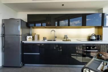 Luxury Beach Apartment with Pool & Gym By Airsuite