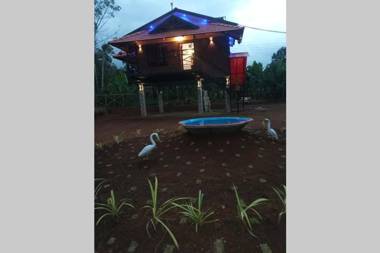 Sansree's Puzhakkal Riverview Cottage