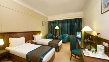 Uday Suites - The Airport Hotel