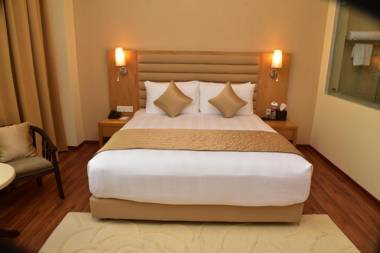 OPULENT HOTEL BY FERNS N PETALS