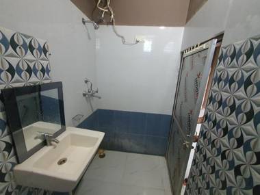 Spot on 82115 Megha Paradise And Guest House