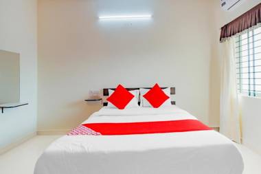 OYO 77067 P N K Suites