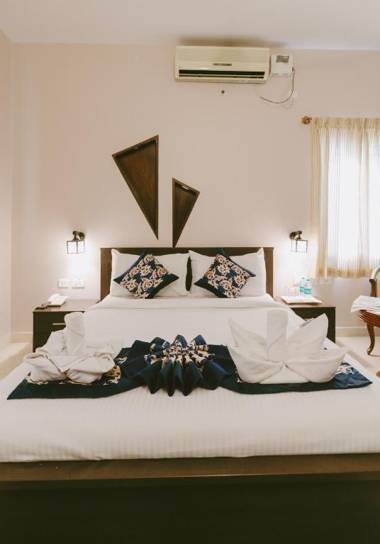 Square Rooms - An Athulya Hotel