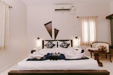 Square Rooms - An Athulya Hotel