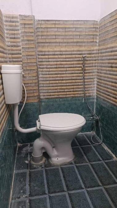 OYO HOME 91438 Hotel Happy Inn