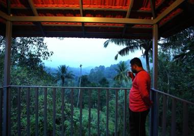 Croods Cottage Wayanad by Lexstays