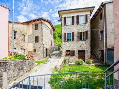 Tuscan house built on the hill of a small mountain village
