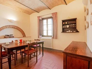 small village of beautiful apartments in the green Tuscan hills and olive groves