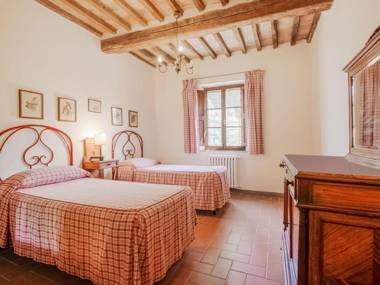 small village of beautiful apartments in the green Tuscan hills and olive groves