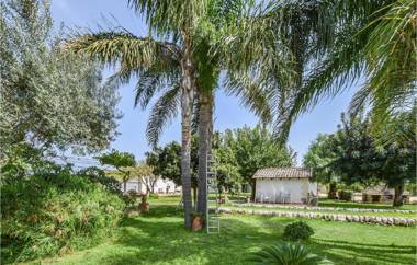 Amazing home in Siracusa with Outdoor swimming pool WiFi and 2 Bedrooms