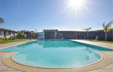 Amazing home in Siracusa with Outdoor swimming pool WiFi and 2 Bedrooms