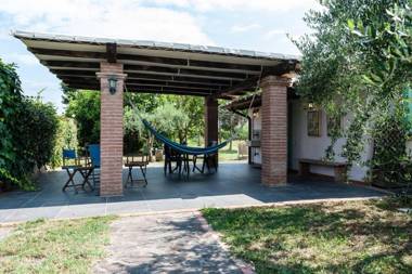 One bedroom villa with shared pool enclosed garden and wifi at Pisa