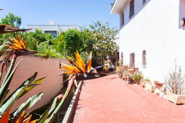 Casa con 3 camere letto e giardino spiaggia m123