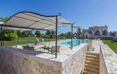 Trulli in ancient farm with pool