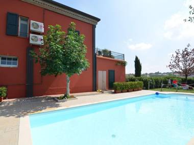 Garden-View Apartment in Coriano Italy with Swimming Pool