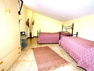 2 bedrooms house at Punta Tramontana 200 m away from the beach with sea view and enclosed garden