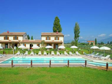 An agritourism complex with views of Assisi.