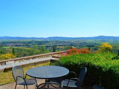 Apartment with 2 pools in the village of Asciano in the hills of Siena