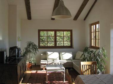 House with large terrace in a small residence with swimming pool surrounded by greenery