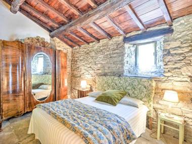 Apartment in the historic medieval village of Serignana with pool and garden