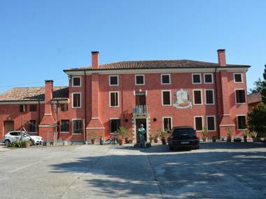 Large property on farmland with swimming pool.