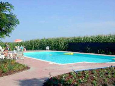 Large property on farmland with swimming pool.