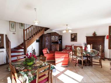 Apartment in old renovated farmhouse with garden surrounded by greenery.