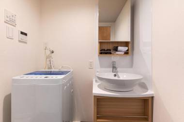 MrKINJO 万座ビーチ前