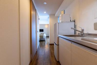 MrKINJO 万座ビーチ前