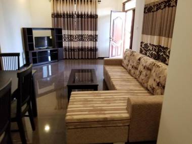 Coral Palm Villa and Apartment