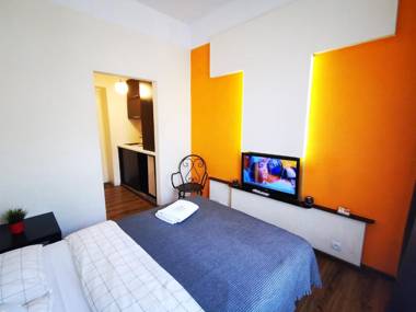 Orange studio with balcony