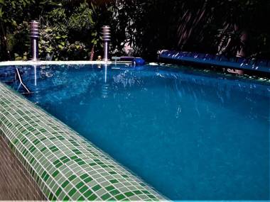 APARTMENTS AT VILLA - swimming pool patio grill garden
