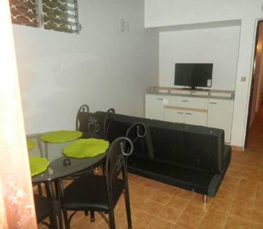 Appartement d'une chambre avec vue sur la mer jardin clos et wifi a Schoelcher a 2 km de la plage