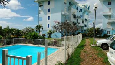 Appartement d'une chambre avec vue sur la mer piscine partagee et balcon amenage a Sainte Anne a 1 km de la plage