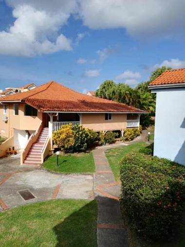 Appartement d'une chambre avec piscine partagee jardin clos et wifi a Sainte Anne a 1 km de la plage