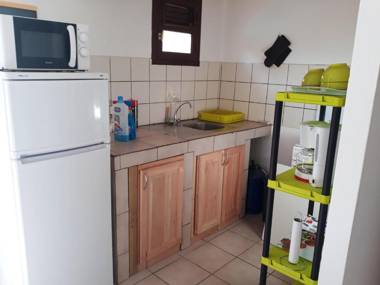 Appartement d'une chambre avec piscine partagee jardin clos et wifi a Ducos