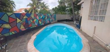 One bedroom appartement with shared pool furnished terrace and wifi at Trou aux Biches 1 km away from the beach