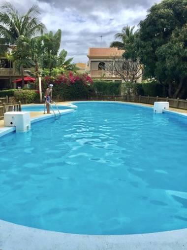 4 bedrooms house at Flic en Flac 100 m away from the beach with shared pool furnished garden and wifi