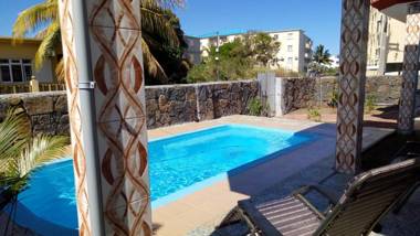3 bedrooms appartement at Les plaines Saint Pierre Flic en Flac 800 m away from the beach with shared pool enclosed garden and wifi