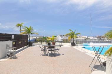Phenomenal Location Near Beach & 5th with Stunning Roof Pool!